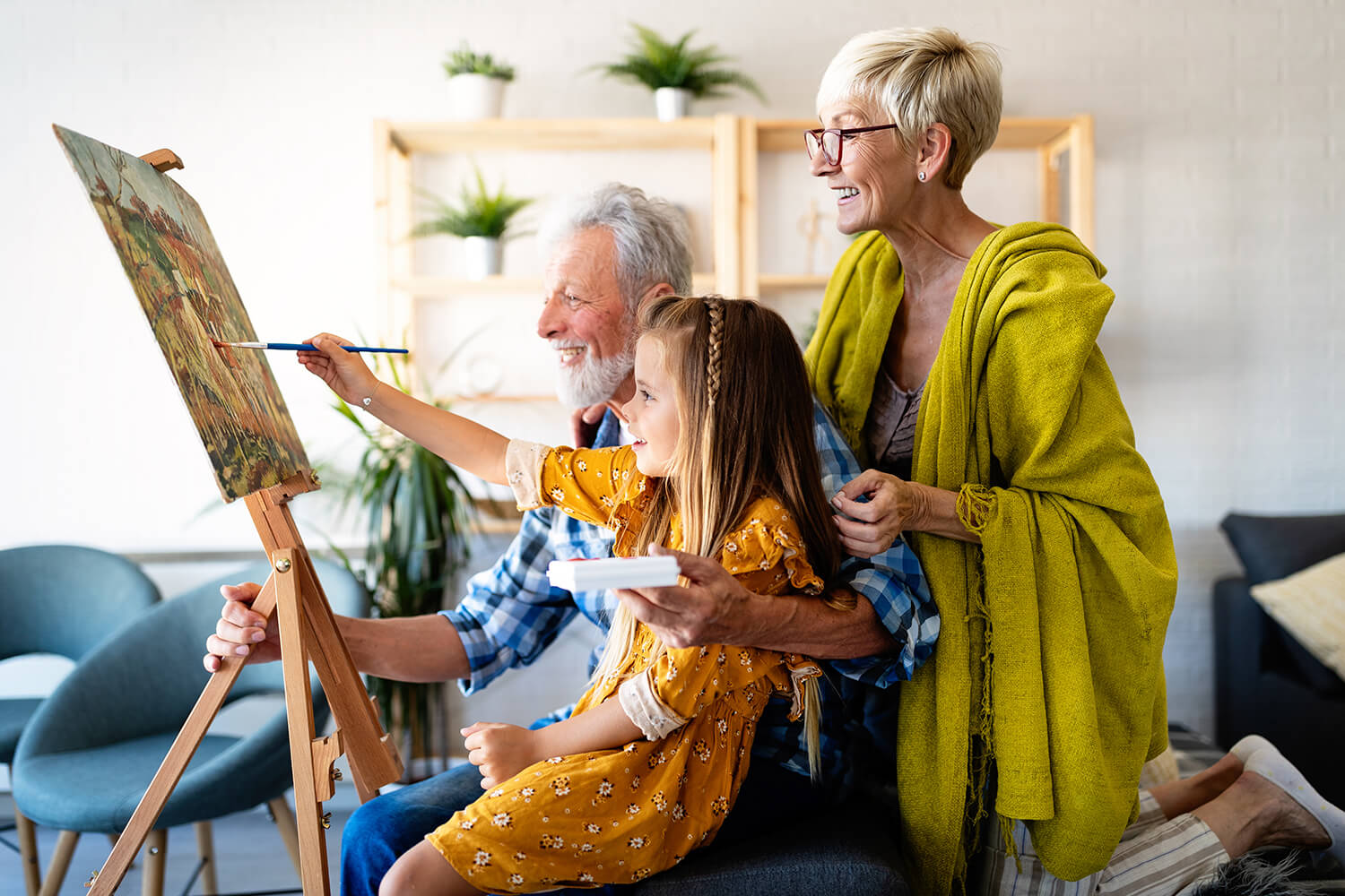 grandparents and grandchild paint